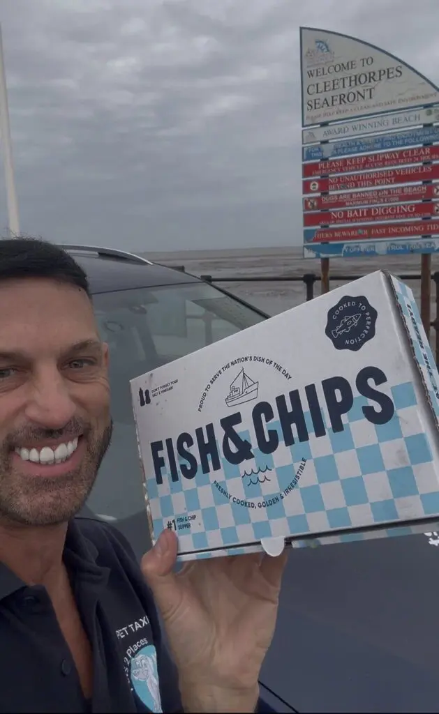 Franchisee enjoying flexible pet transport business lifestyle at Cleethorpes seafront